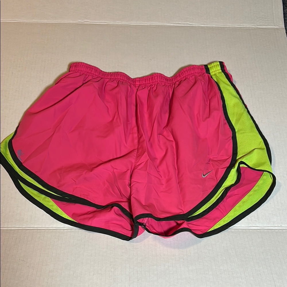 Nike Pink and Yellow Athletic Shorts with Curved Hem